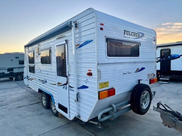 990<br><br>2006 FULCHER GRAND TOURER 18'6 COMBO SHOWER AND TOILET CARAVAN<br><br>WEIGHTS<br>Tare: 1764 Kg<br>GTM: 2000 Kg<br>ATM: 2164 Kg<br>Ball: 170 Kg<br><br>EXTERNAL<br>50mm Ball Coupling & Handbrake<br>6 Inch A-Frame<br>Drop Down Corner Steadies Each Corner<br>Large Toolbox<br>Front Grab Handles<br>Front Window With Protector<br>White Cladding<br>Front Boot<br>Roll Out Awning<br>1x External Lights<br>Entry Door With Separate Screen<br>Roll Out Awning<br>Rear Grab Handles<br>Rear Bar With Spare Tire<br>2 x Water Tanks<br>Battery Pack <br><br>INTERNAL<br>Hot Water System<br>Roof Top Air Conditioner<br>3 Way Fridge<br>Microwave<br>Stereo & Speakers<br>Cooktop With Grill & Oven<br>Stainless Sink With Mixer<br>L Shape Dinette<br>Skylights<br>Queen Bed With Storage<br>TV Antenna<br>12V Lighting Throughout<br>Large Windows<br>Combo Toilet & Shower<br><br>This caravan will be supplied with current roadworthy and gas certificates