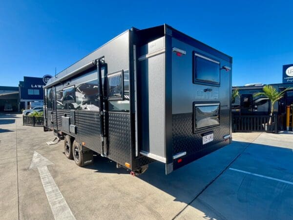 990<br><br>2021 LOTUS CARAVAN TRANSFORMER TF233 - 23'3 DUAL SLIDE OUT DOUBLE BUNK OFF-ROAD FAMILY CARAVAN<br><br>WEIGHTS<br>Tare:&nbsp;&nbsp; 3215 Kg<br>GTM:&nbsp;&nbsp;&nbsp;3700 Kg<br>ATM:&nbsp;&nbsp;&nbsp;4000 Kg<br>Ball:&nbsp;&nbsp;&nbsp; 300 Kg<br>Payload: 785 Kg<br><br>EXTERNAL<br>DO-45 Coupling<br>TRUSS Chassis <br>17 Tyres <br>12 Brakes <br>Torflex 4T <br>Stoneguard <br>Dometic DRS <br>Toolbox <br>Roll Out Awning <br>External Picnic Table <br>Entertainment Hatch <br>4 x 170w Solar Panels <br>Reverse Camera <br>Awning Lights <br>Front LED Light Bar <br>3 x 95L Fresh Water Tanks<br>100Lt Grey Water Tank <br>Fusion Sound Bar <br>Single Entry Step <br>Gas Bayonet <br>ALKO ESC <br>Hot & Cold Water Tap on A-Frame <br>Large Grab Handle <br>INTERNAL<br>Queen Island Bed With Storage<br>Slide Out Club Lounge INC TIC Cushion <br>Slide Out Rear Dual Bunks <br>Innerspring Mattress Bunks <br>Custom Mattress in Main Bed and Bolster <br>Girard HWS <br>Dometic Fridge <br>Microwave <br>TV in Main Living <br>Built In TV in Bunk Room <br>Large Storage Area in Bunk Room <br>Air-Conditioner <br>Washing Machine Front Loader <br>4 x 12v Fans <br>Gas Stove & Full Oven and Grill <br>2600w Enerdrive Inverter <br>2 x 200AH B-Tec Lithium Batteries <br>Redarc BMS 30AMP <br>RV WIFI <br>Black Sink and 3-Way Mixer Tap <br>Large Double Glazed Windows<br>Flyscreens & Blockouts<br>LED Lighting Throughout<br>Large Skylights<br><br>This caravan will be supplied with current roadworthy and gas certificates