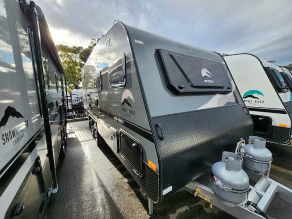  the SRC20F delivers everything you need to make it feel like home — with the build quality to go the distance.<br><br>Factory Fitted Options:<br>Leather Uphostry<br><br>12v fans in main bed area and lounge<br><br>Extended A-frame<br><br>95L Grey Water<br><br>Telescopic tanle leg with TIC (table infill)<br><br>Projecta PM300-BT Management System<br><br>Family-Friendly Features:<br>Double bunk layout<br><br>Spacious full rear ensuite – includes separate shower and toilet<br><br>L-shaped lounge with upgraded leather trim – the perfect spot for family meals or board games<br><br>Queen bed with overhead storage and optioned 12v fan<br><br>Telescopic table leg and in fill cushion