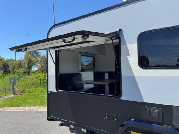  it has all the benefits of a small easy to tow camper with the convenience of a full caravan.<br /><br /><br />200W Solar Panel x 2<br />Outdoor Lights<br />200AH Renogy Pro Lithium Battery Renogy Pro Battery Management System<br />Ensuite Mirror Light<br />Reading Lights<br />2000W Inverter<br />DC/DC Charger<br />Flat Screen TV & TV Antenna<br />185L Compressor Fridge<br />Stereo with Internal and External Speakers<br />2 Plate Induction Cooktop<br />Timberless Single Piece Roof